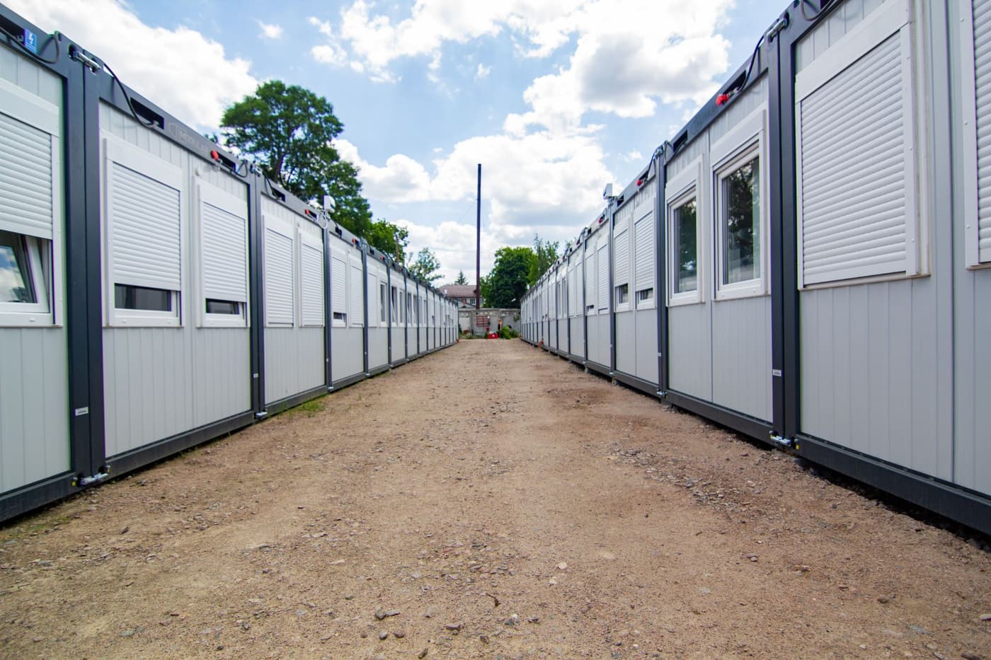 Rows of modular workforce accommodation cabins on a site compound